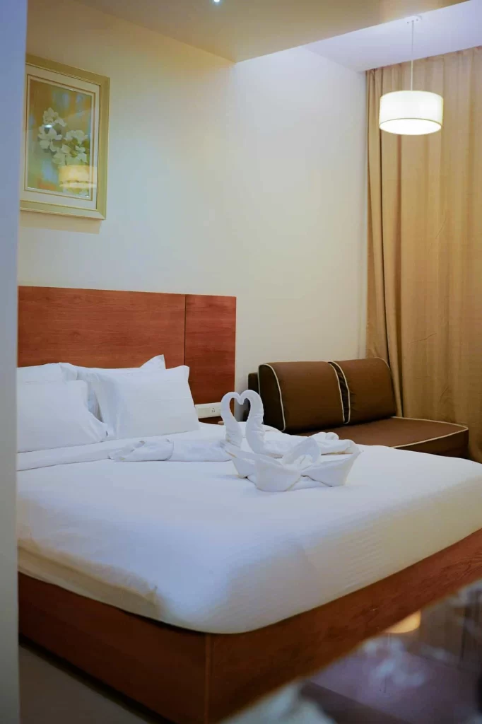 Well-appointed guest bedroom at Chattarpur Farms in Nagpur