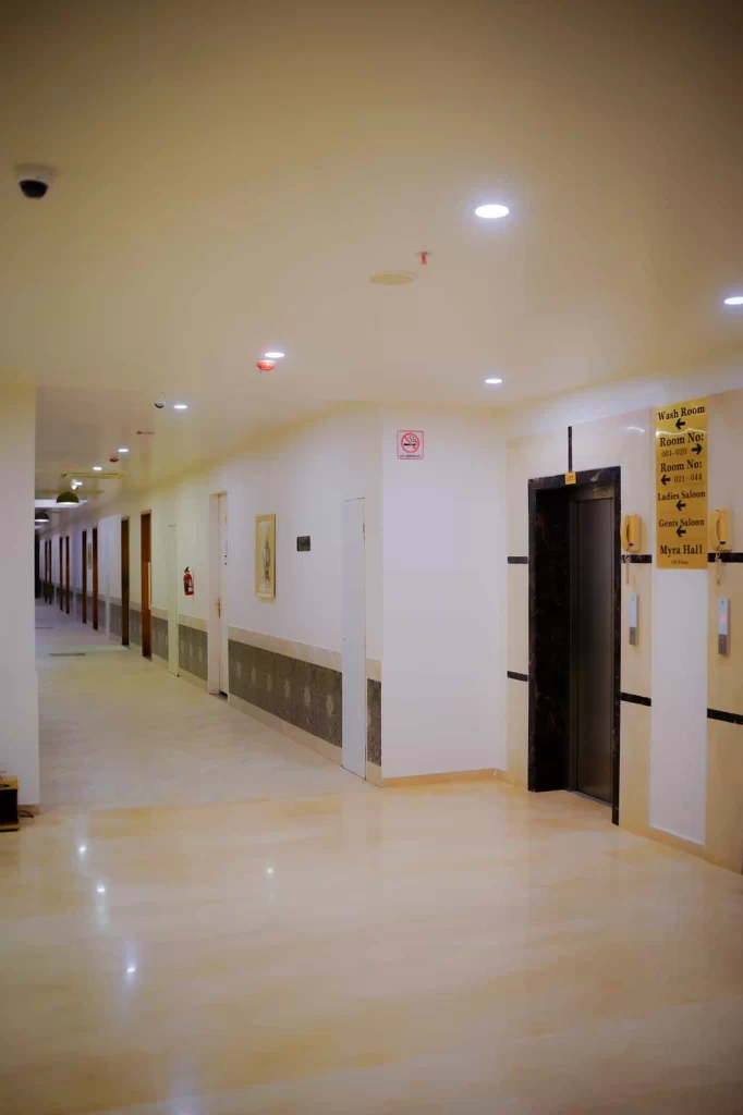 Guest room corridor at Chattarpur Farms in Nagpur