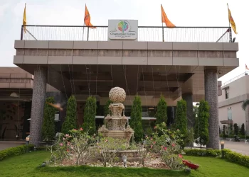 Front entrance and landscaped property at Chattarpur Farms in Nagpur