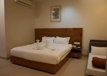 Deluxe room accommodation for wedding guests at Chattarpur Farms in Nagpur