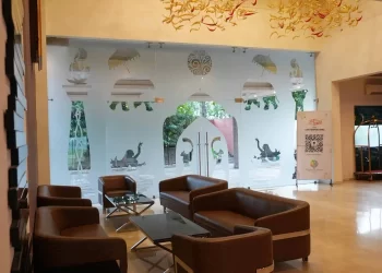 Reception lounge seating at Chattarpur Farms in Nagpur