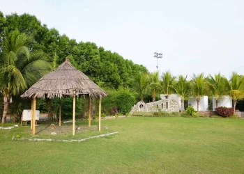 Gazebo and landscaped lawn at Tulip Lawn Chattarpur Farms in Nagpur