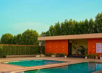 Lotus Lagoon outdoor swimming pool at Chattarpur Farms in Nagpur