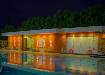 Lotus Lagoon swimming pool illuminated at night in Nagpur