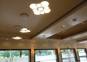 Interior ceiling and seating area of Iris Hall at Chattarpur Farms in Nagpur