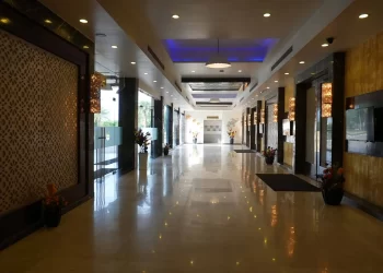 Entrance corridor to Carnation Hall at Chattarpur Farms in Nagpur