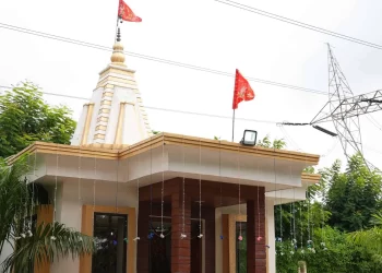 Temple entrance within the Chattarpur Farms property