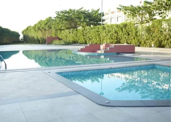 Lotus Lagoon swimming pool at Chattarpur Farms in Nagpur